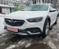 Білий Опель Інсігнія, об'ємом двигуна 2 л та пробігом 231 тис. км за 15000 $, фото 5 на Automoto.ua