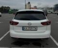 Білий Опель Інсігнія, об'ємом двигуна 1.96 л та пробігом 250 тис. км за 15300 $, фото 5 на Automoto.ua