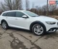 Білий Опель Інсігнія, об'ємом двигуна 2 л та пробігом 231 тис. км за 15000 $, фото 14 на Automoto.ua