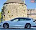 Білий Опель Інсігнія, об'ємом двигуна 1.6 л та пробігом 228 тис. км за 15800 $, фото 6 на Automoto.ua