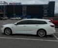 Білий Опель Інсігнія, об'ємом двигуна 1.96 л та пробігом 250 тис. км за 15300 $, фото 7 на Automoto.ua