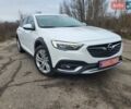 Білий Опель Інсігнія, об'ємом двигуна 2 л та пробігом 231 тис. км за 15000 $, фото 1 на Automoto.ua