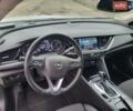 Білий Опель Інсігнія, об'ємом двигуна 2 л та пробігом 231 тис. км за 15000 $, фото 16 на Automoto.ua