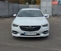 Білий Опель Інсігнія, об'ємом двигуна 2 л та пробігом 225 тис. км за 16500 $, фото 10 на Automoto.ua