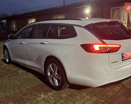 Білий Опель Інсігнія, об'ємом двигуна 1.96 л та пробігом 149 тис. км за 15500 $, фото 5 на Automoto.ua