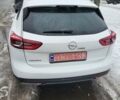 Білий Опель Інсігнія, об'ємом двигуна 2 л та пробігом 231 тис. км за 15000 $, фото 8 на Automoto.ua