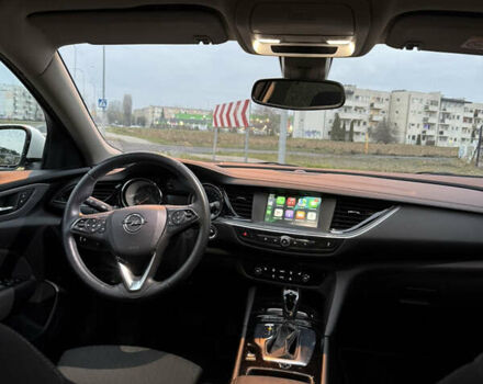 Белый Опель Инсигния, объемом двигателя 2 л и пробегом 178 тыс. км за 14000 $, фото 10 на Automoto.ua