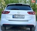 Білий Опель Інсігнія, об'ємом двигуна 1.6 л та пробігом 228 тис. км за 15800 $, фото 20 на Automoto.ua