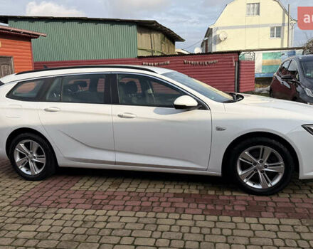 Белый Опель Инсигния, объемом двигателя 1.96 л и пробегом 149 тыс. км за 15900 $, фото 6 на Automoto.ua