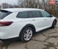 Білий Опель Інсігнія, об'ємом двигуна 2 л та пробігом 231 тис. км за 15000 $, фото 13 на Automoto.ua