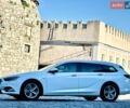 Білий Опель Інсігнія, об'ємом двигуна 1.6 л та пробігом 228 тис. км за 15800 $, фото 14 на Automoto.ua