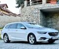 Білий Опель Інсігнія, об'ємом двигуна 1.6 л та пробігом 228 тис. км за 15800 $, фото 1 на Automoto.ua