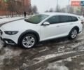 Білий Опель Інсігнія, об'ємом двигуна 2 л та пробігом 231 тис. км за 15000 $, фото 2 на Automoto.ua