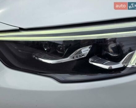 Білий Опель Інсігнія, об'ємом двигуна 2 л та пробігом 225 тис. км за 16500 $, фото 11 на Automoto.ua