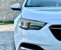 Білий Опель Інсігнія, об'ємом двигуна 1.6 л та пробігом 228 тис. км за 15800 $, фото 25 на Automoto.ua