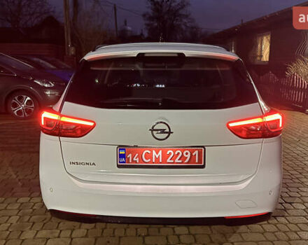 Білий Опель Інсігнія, об'ємом двигуна 1.96 л та пробігом 149 тис. км за 15500 $, фото 4 на Automoto.ua