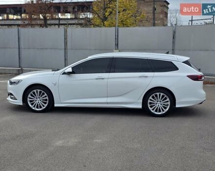 Білий Опель Інсігнія, об'ємом двигуна 2 л та пробігом 225 тис. км за 16500 $, фото 7 на Automoto.ua