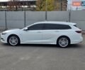 Білий Опель Інсігнія, об'ємом двигуна 2 л та пробігом 225 тис. км за 16500 $, фото 7 на Automoto.ua