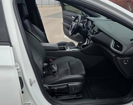 Білий Опель Інсігнія, об'ємом двигуна 2 л та пробігом 225 тис. км за 16500 $, фото 44 на Automoto.ua