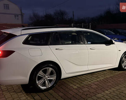 Білий Опель Інсігнія, об'ємом двигуна 1.96 л та пробігом 149 тис. км за 15500 $, фото 2 на Automoto.ua