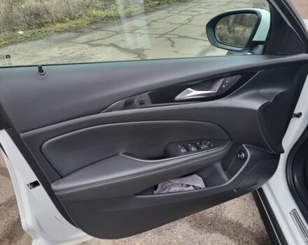 Білий Опель Інсігнія, об'ємом двигуна 2 л та пробігом 230 тис. км за 15400 $, фото 9 на Automoto.ua