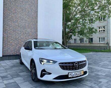 Белый Опель Инсигния, объемом двигателя 2 л и пробегом 189 тыс. км за 18600 $, фото 1 на Automoto.ua