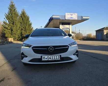 Белый Опель Инсигния, объемом двигателя 2 л и пробегом 153 тыс. км за 16800 $, фото 1 на Automoto.ua