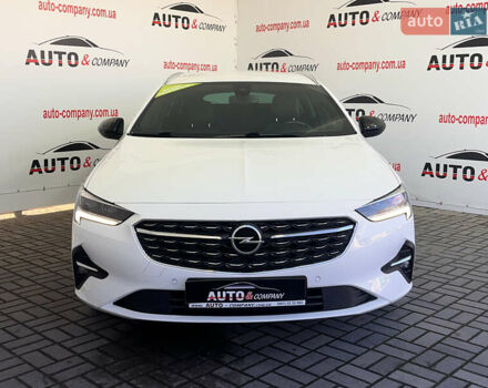 Белый Опель Инсигния, объемом двигателя 1.96 л и пробегом 145 тыс. км за 19750 $, фото 1 на Automoto.ua