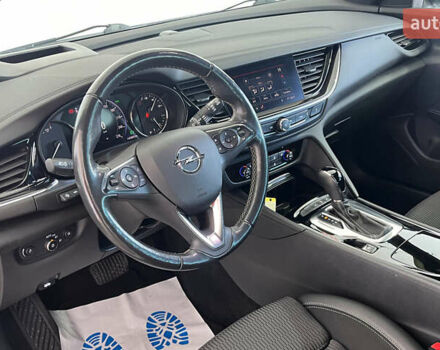 Белый Опель Инсигния, объемом двигателя 1.96 л и пробегом 145 тыс. км за 19750 $, фото 6 на Automoto.ua