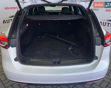 Білий Опель Інсігнія, об'ємом двигуна 1.96 л та пробігом 145 тис. км за 19750 $, фото 4 на Automoto.ua