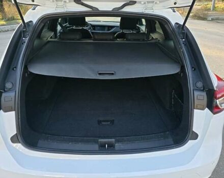 Белый Опель Инсигния, объемом двигателя 2 л и пробегом 153 тыс. км за 16800 $, фото 19 на Automoto.ua