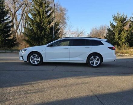 Белый Опель Инсигния, объемом двигателя 2 л и пробегом 153 тыс. км за 16800 $, фото 4 на Automoto.ua