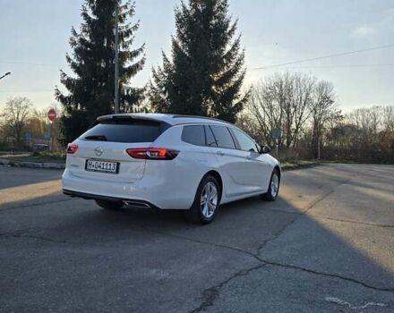 Белый Опель Инсигния, объемом двигателя 2 л и пробегом 153 тыс. км за 16800 $, фото 6 на Automoto.ua