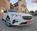 Белый Опель Инсигния, объемом двигателя 1.96 л и пробегом 193 тыс. км за 17999 $, фото 2 на Automoto.ua