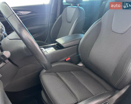 Білий Опель Інсігнія, об'ємом двигуна 1.96 л та пробігом 145 тис. км за 19750 $, фото 7 на Automoto.ua