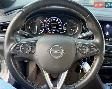 Білий Опель Інсігнія, об'ємом двигуна 2 л та пробігом 103 тис. км за 14500 $, фото 9 на Automoto.ua