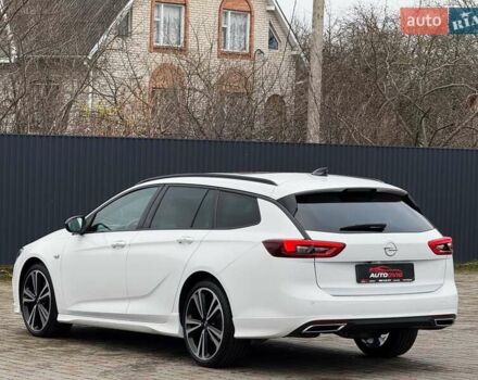 Белый Опель Инсигния, объемом двигателя 2 л и пробегом 169 тыс. км за 20999 $, фото 6 на Automoto.ua