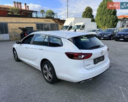 Білий Опель Інсігнія, об'ємом двигуна 2 л та пробігом 103 тис. км за 14500 $, фото 11 на Automoto.ua