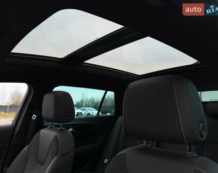 Белый Опель Инсигния, объемом двигателя 2 л и пробегом 169 тыс. км за 20999 $, фото 58 на Automoto.ua