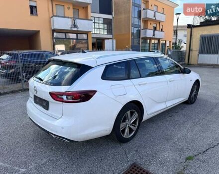 Білий Опель Інсігнія, об'ємом двигуна 2 л та пробігом 103 тис. км за 14500 $, фото 1 на Automoto.ua