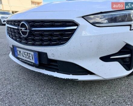 Білий Опель Інсігнія, об'ємом двигуна 2 л та пробігом 103 тис. км за 14500 $, фото 24 на Automoto.ua
