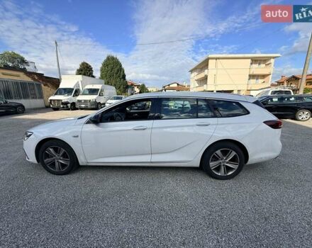 Білий Опель Інсігнія, об'ємом двигуна 2 л та пробігом 103 тис. км за 14500 $, фото 18 на Automoto.ua