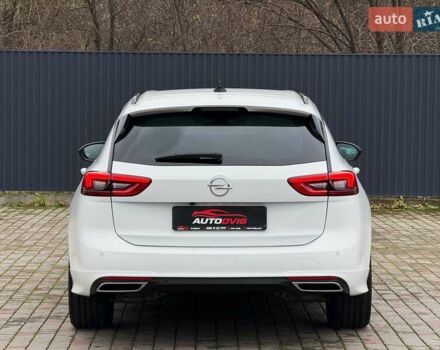 Белый Опель Инсигния, объемом двигателя 2 л и пробегом 169 тыс. км за 20999 $, фото 5 на Automoto.ua