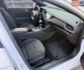Білий Опель Інсігнія, об'ємом двигуна 2 л та пробігом 103 тис. км за 14500 $, фото 3 на Automoto.ua