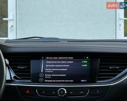 Белый Опель Инсигния, объемом двигателя 2 л и пробегом 169 тыс. км за 20999 $, фото 98 на Automoto.ua