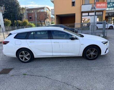 Білий Опель Інсігнія, об'ємом двигуна 2 л та пробігом 103 тис. км за 14500 $, фото 5 на Automoto.ua