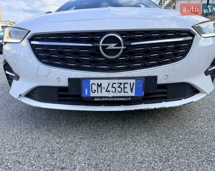 Білий Опель Інсігнія, об'ємом двигуна 2 л та пробігом 103 тис. км за 14500 $, фото 13 на Automoto.ua