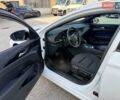 Білий Опель Інсігнія, об'ємом двигуна 2 л та пробігом 103 тис. км за 14500 $, фото 8 на Automoto.ua