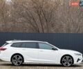 Белый Опель Инсигния, объемом двигателя 2 л и пробегом 169 тыс. км за 20999 $, фото 3 на Automoto.ua