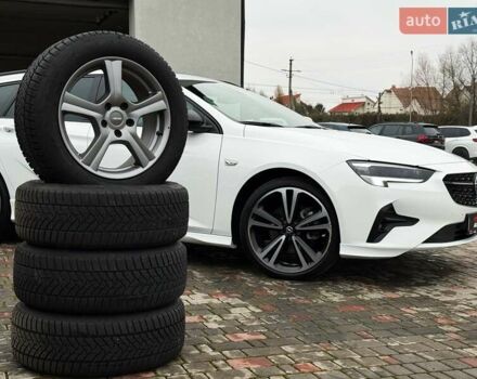 Белый Опель Инсигния, объемом двигателя 2 л и пробегом 169 тыс. км за 20999 $, фото 30 на Automoto.ua